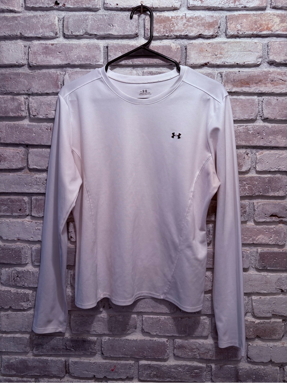 Women’s Under Armour long-sleeve athletic top